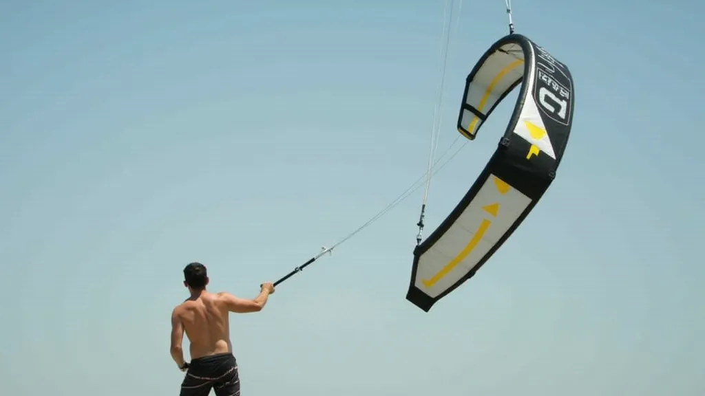 Person flying a dual-line kite bar